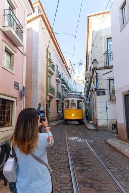 Alfama Photo Walk: Lisbon Photography Tour with a Local - The yellow tram factor: capturing Lisbon’s movement without losing control
