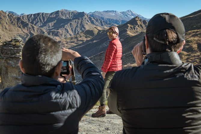 AuthenticAs Discover Queenstown - Professional Photography & Exclusive 4WD Tour - Stop 2: Lake Hayes for clean mountain scenes across the water