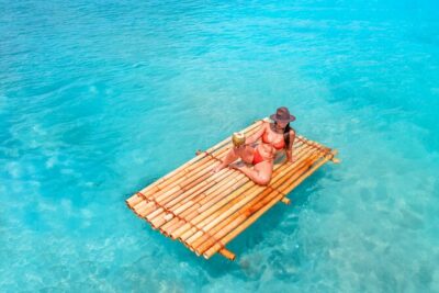 Bamboo Raft Photoshoot + FREE Videos, Shots and Cocktails - What the 30-minute bamboo raft photoshoot feels like on the water