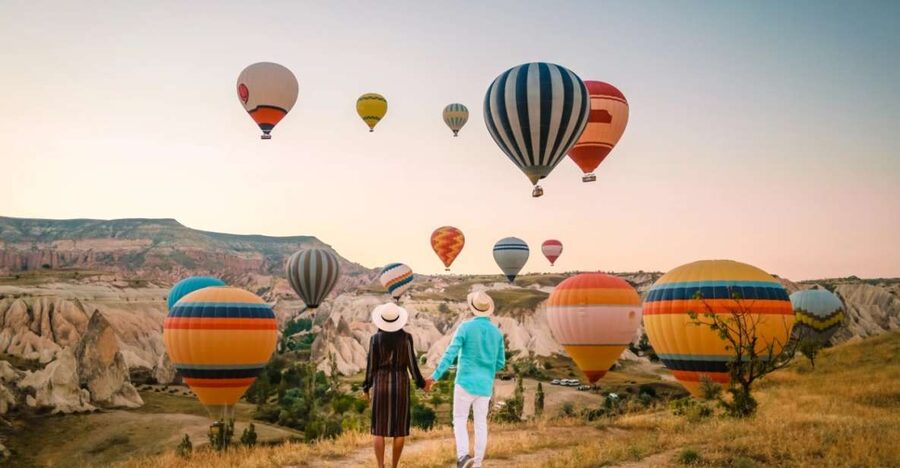 Cappadocia: Sunrise Balloon Watching Tour with Photographer - Love Valley and Fairy Chimneys: When the Balloons Float Over You