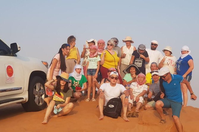 Dubai Half day Desert Safari Quad Bike & Flying Dress Photoshoot - The Show Package: Belly Dance, Tanoura, and the Fire Show