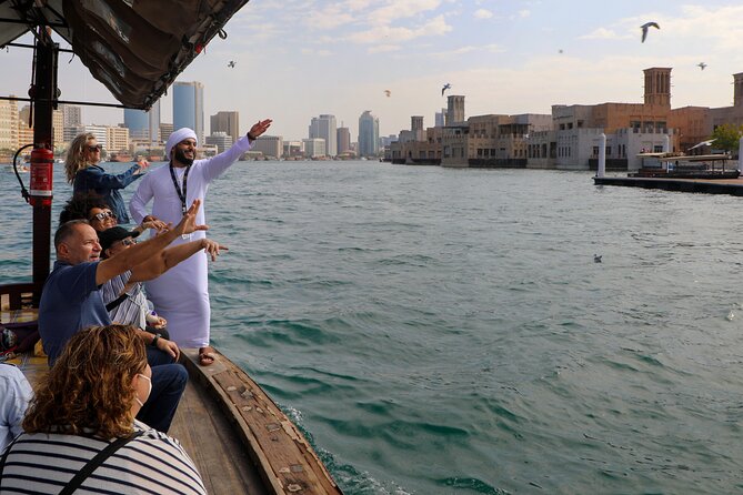 Dubai: Photography Tour in Al Fahidi District w/Abra Ride - Stop 1: Al Fahidi Historical Neighbourhood walking photos that feel like real Dubai