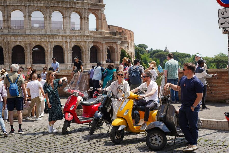 Explore city on Vespa with Professional Photographer - What You Actually Get: Helmets, Coffee, and 20 JPEGs
