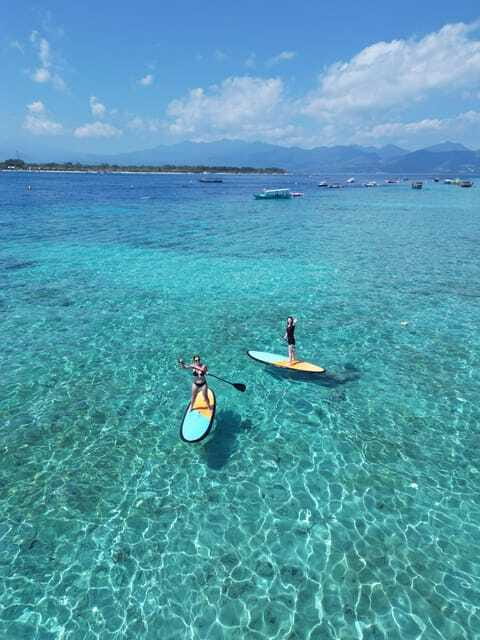 Gili sunrise stand-up paddle boarding (drone photoshoot) - The sunrise payoff: peaceful water, possible turtle sightings, and clear memories