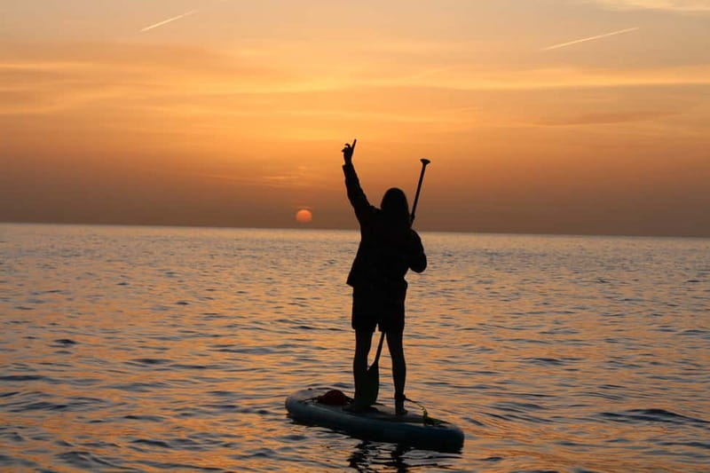 Golfo Aranci: Sup with dolphins, aperitif & photo shoot - Cala Moresca: your SUP practice, then a swim and photo stop