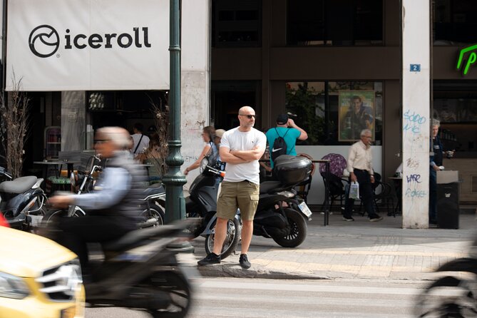 Guided Street Photography Tour in Athens - Walking central Athens toward Panepistimio and stronger street frames