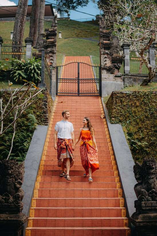 Hire Bali Private Professional Photographer with Edit Photos - Ubud Waterfalls: Getting Wet Without Losing the Photos