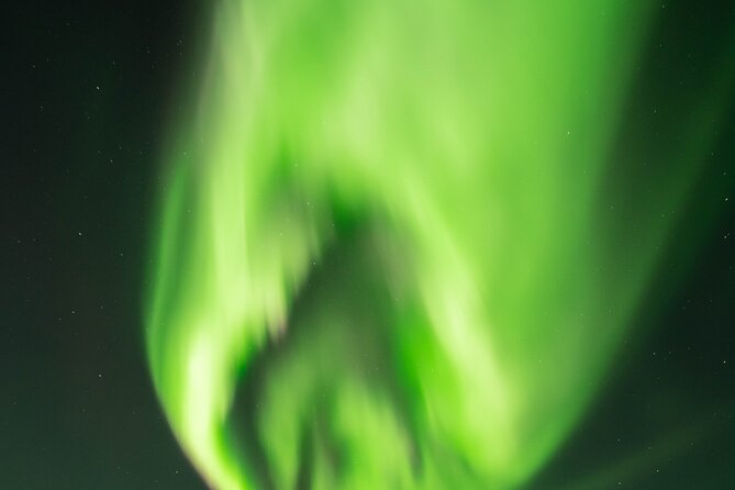 Northern Lights Aurora Chasing Adventure Tour & Free Photography - Group size and language: a calmer experience