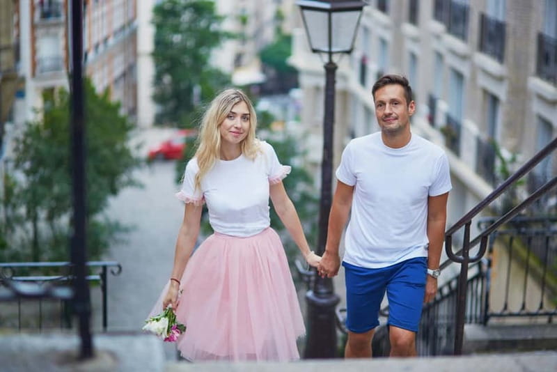 Paris: Private Montmartre Photoshoot with Parisian Charm - Galerie Montmartre, café fronts, and the John Wick 4 corners