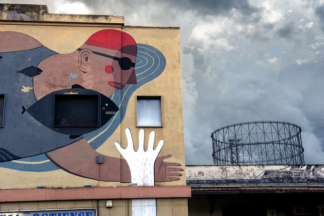 Photo Tour in the Ostiense district: forfeiture and redevelopment - Key highlights to expect