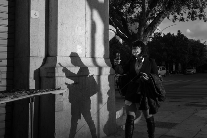 Photo Tour of the Secrets of Palermo - Mura, Bastione e Porta Carini: street food, stone walls, and motion