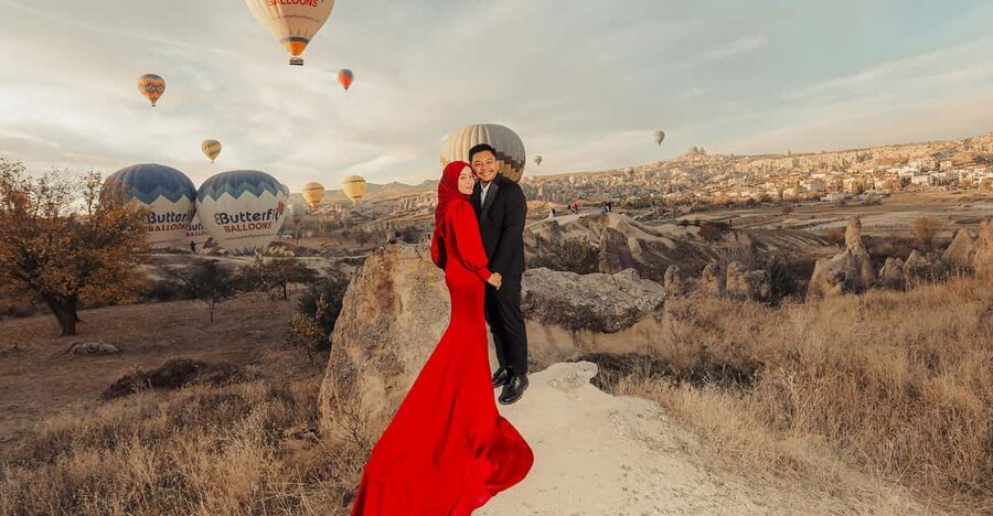 Private Photo Shoot in Cappadocia With Transportation 2 hour - Love Valley: closer balloon angles over fairy-chimney style views