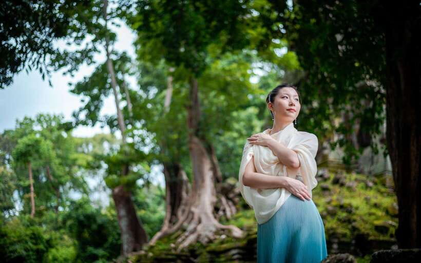 Professional Photoshoot in Angkor Archaeological Park - Ta Prohm, or Tomb Raider ruins with portrait focus