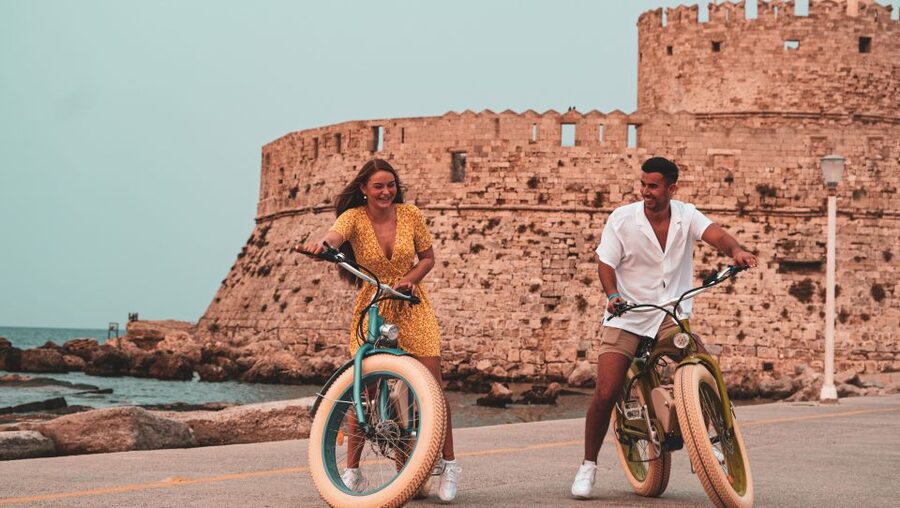 Rhodes: Retro eBike Highlights Tour w/ Personal Photographer - Colossus of Rhodes: a landmark moment with built-in storytelling