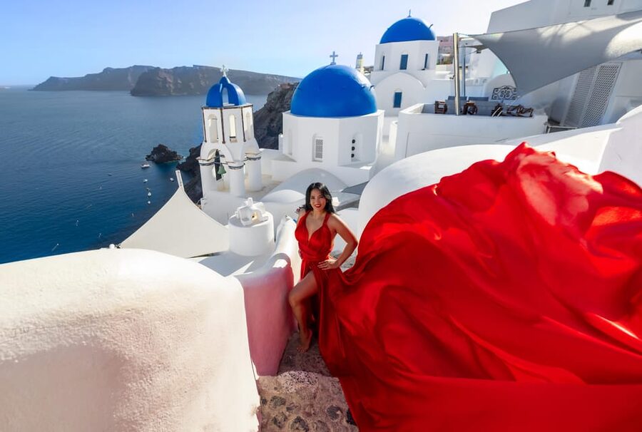 Santorini 1-Hour Private Flying Dress Photoshoot Blue Domes - Price and Value: $447 for Up to 4 People