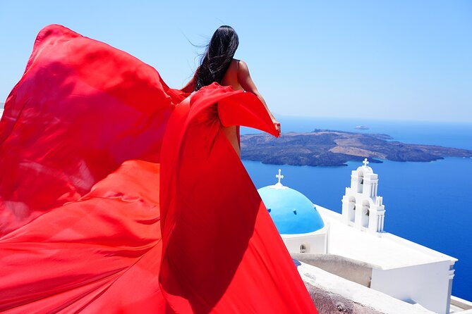 Santorini 2h Private Flying Dress Photoshoot with Transportation - Stop 3: Imerovigli—where the cliffs can make you feel bigger than the camera