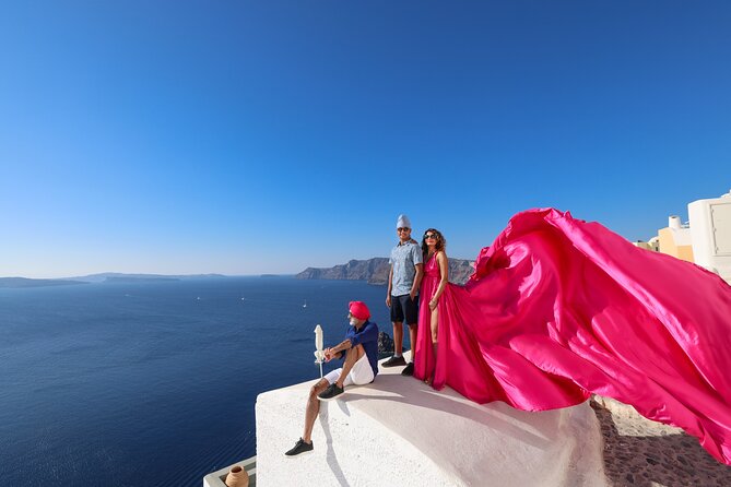 Santorini Flying Dress Photography - Your photographer team: comfort, communication, and real momentum