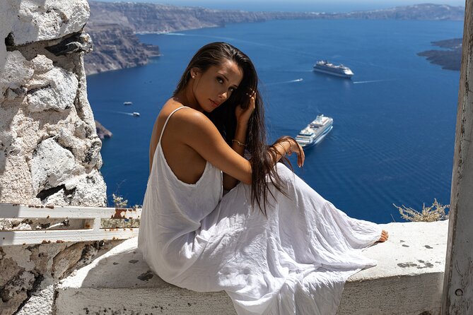 Santorini Private Casual Photoshoot in Oia and Imerovigli - Stop 1: Blue dome Santorini views that frame your whole trip