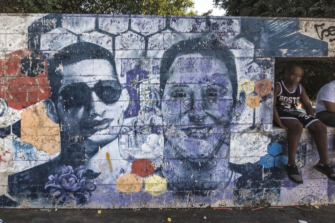 Torpignattara Photo Tour: melting pot, street art and politics - Starting at Piazza Roberto Malatesta and ending near Arco di Travertino (Metro Line A)