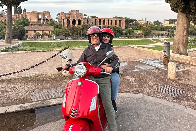 Vespa experience guided by us & Photo shoot - Passing the Altar of Peace, Vittoriano Area, the Colosseum Exterior, and More