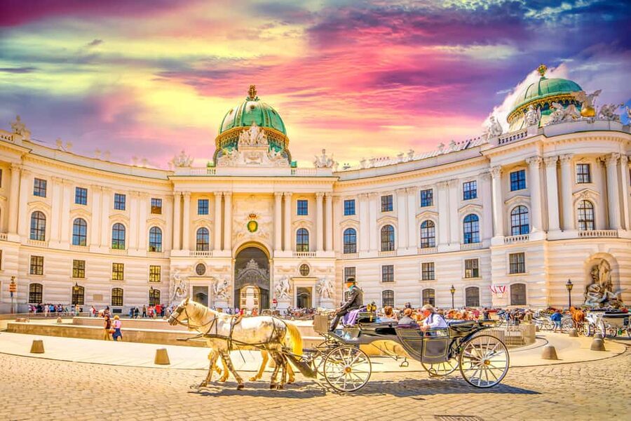 Vienna: Christmas Photoshoot with a Pro Photographer - Ankeruhr clock and Stephansplatz cathedral finish: end with the most recognizable frame