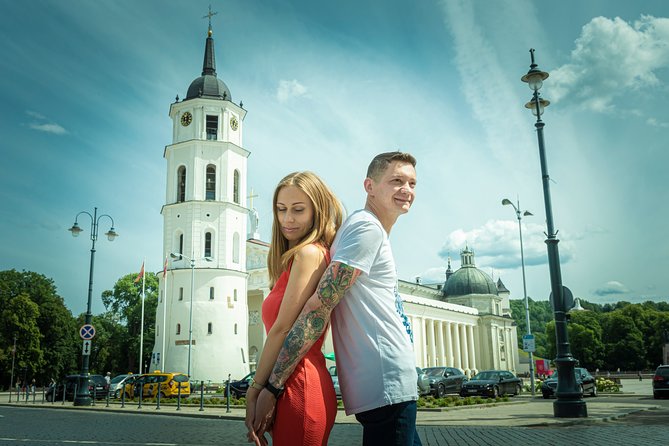Vilnius Private Photoshoot Tour - Town Hall (Rotuse) and the fountain in Town Hall Square: classic Vilnius meets modern lines