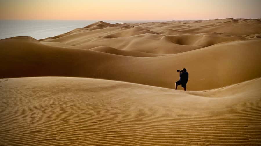 Walvis Bay: Sandwich Harbour Sunset Photography Tour - Kuiseb River Delta dry riverbed stop: wildlife odds and photo setups