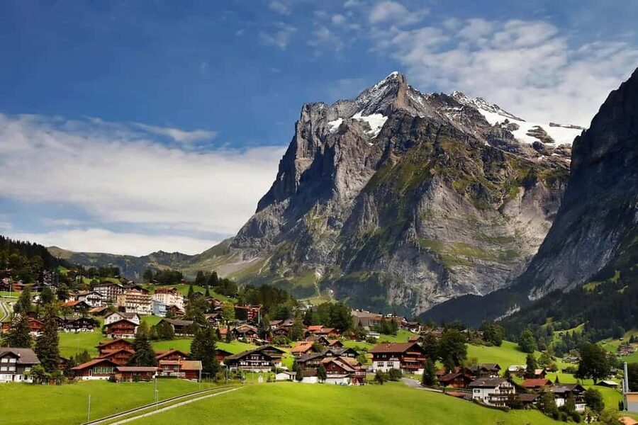 Zurich: Day Trip to Grindelwald & Interlaken with Photoshoot - Lauterbrunnen and Staubbachfall: the misty closer-than-you-expect moment